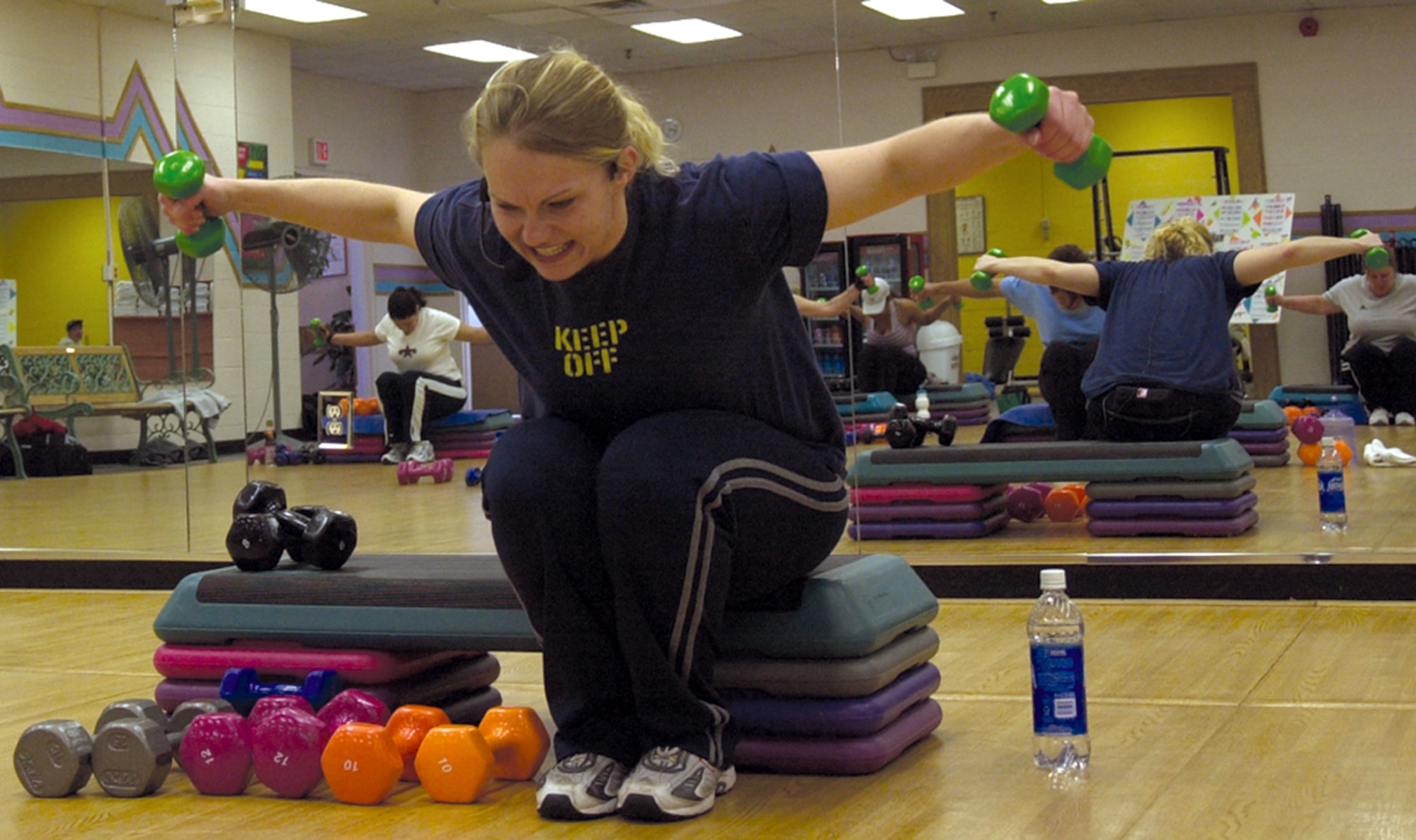 SEYMOUR JOHNSON AIR FORCE BASE, N.C. -- Fitness instructor Keyra Donaldson leads one of her classes here.  She teaches 25 classes per week, averaging 12 people per class.  The classes range from 35 to 90 minutes each and include circuit, abdominal, weight lifting and spinning.  Mrs. Donaldson lost 115 pounds since 2000.  (U.S. Air Force photo by Senior Airman J.G. Buzanowski)
