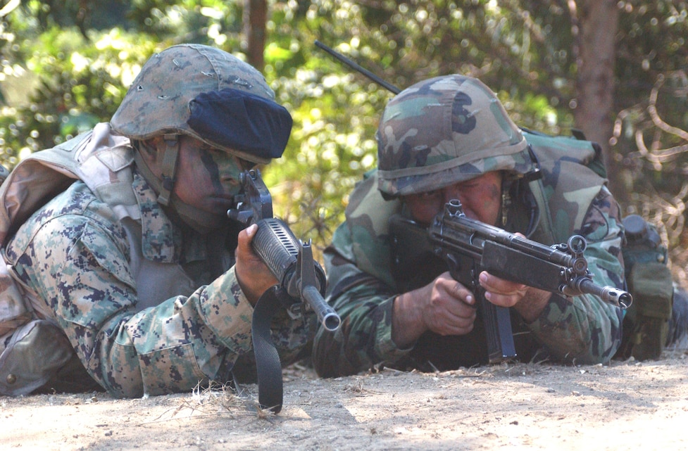 AL ASAD, Iraq -- Marines assigned to MWCS-28 man the systems control center here March 10.  Working 24 hours a day, seven days a week, the SysCon Marines control all communications locally and act as an interface between here and other major subordinate commands.