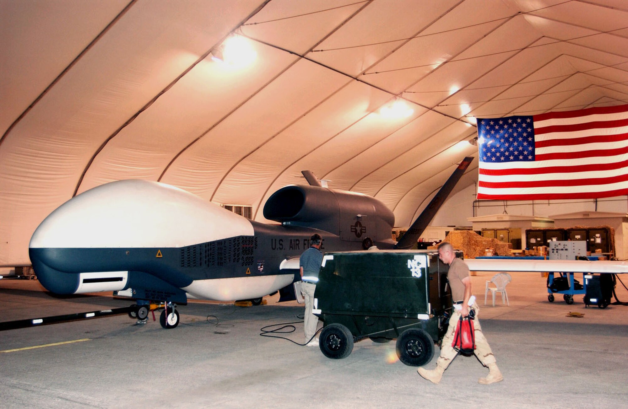 SOUTHWEST ASIA -- Global Hawk is an unmanned aerial vehicle.  It is forward deployed to Southwest Asia to provide real-time imagery in support of operations Enduring Freedom and Iraqi Freedom.  (U.S. Air Force photo by Staff Sgt. Justin Jacobs)