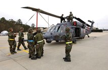 MOODY AIR FORCE BASE, Ga. -- Airmen work on an HH-60G Pave Hawk helicopter during the kick-off of the 347th Rescue Wing's operational readiness inspection.  The Air Force's only combat search and rescue wing is undergoing its first ORI since transitioning to Air Force Special Operations Command in 2003.  (U.S. Air Force photo by Airman 1st Class Joshua Jasper)