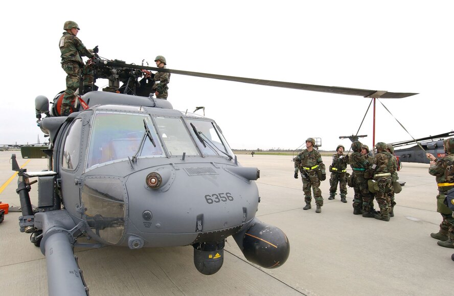 MOODY AIR FORCE BASE, Ga. -- Airmen work on an HH-60G Pave Hawk helicopter during the kick-off of the 347th Rescue Wing's operational readiness inspection.  The Air Force's only combat search and rescue wing is undergoing its first ORI since transitioning to Air Force Special Operations Command in 2003.  (U.S. Air Force photo by Airman 1st Class Joshua Jasper)