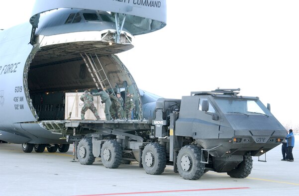 SELFRIDGE AIR NATIONAL GUARD BASE, Mich. -- A C-5 Galaxy undergoes loading and unloading trials with the Army's prototype general purpose vehicle here.  The exercise follows earlier tests of the vehicle on a C-130 Hercules from the 171st Airlift Squadron based here.  The C-5 is from Dover Air Force Base, Del., with a mixed crew of active-duty and Reserve Airmen.  (U.S. Air Force photo by Master Sgt. Clancey Pence)