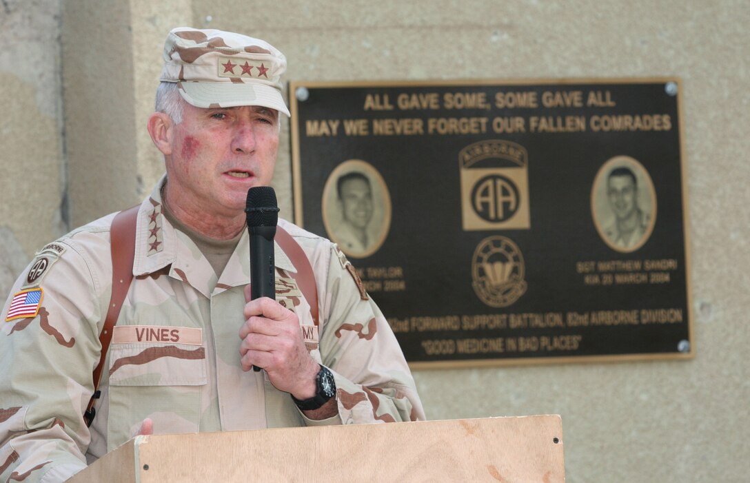 Army Lt. Gen. John R. Vines, commanding general of Multi National Corps Iraq, addresses the audience during a plaque re-dedication ceremony March 15, 2005, for Army Lt. Col. Mark Taylor and Army Sgt. Matthew Sandri.  Both Soldiers were killed in action March 20, 2004 inside the medical compound on Camp Fallujah, Iraq.