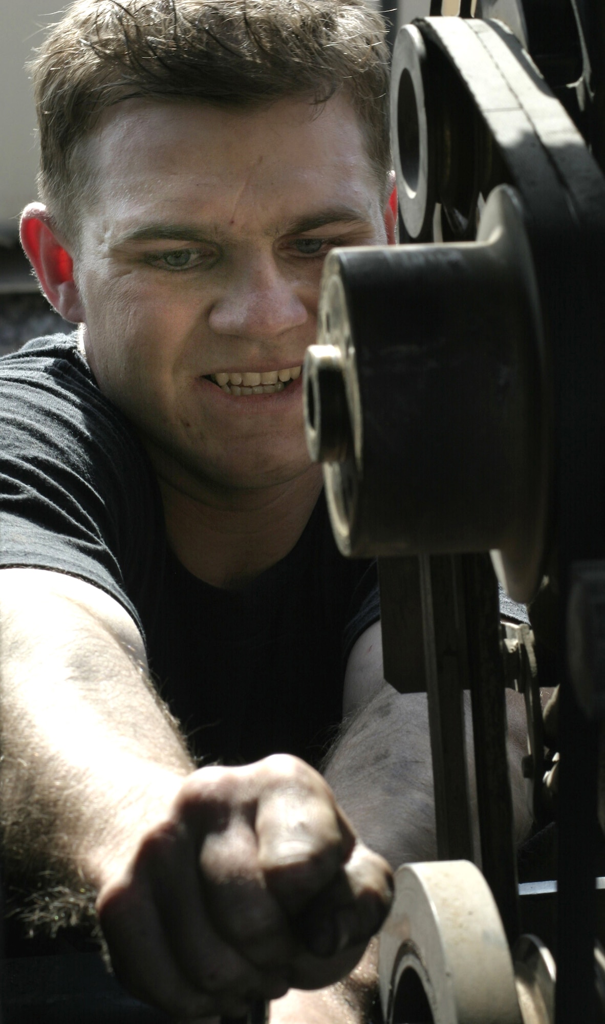 BALAD AIR BASE, Iraq -- Senior Airman Matthew Hendrickson changes a main seal on a generator.  He is a 727th Expeditionary Air Control Squadron aerospace ground equipment journeyman.  (U.S. Air Force photo by Senior Airman Adam Bradford)