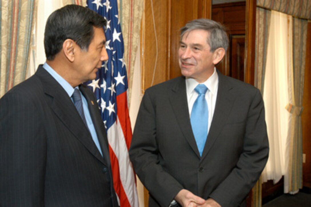 Indonesian Minister of Defense Juwono Sudarsono (left) talks with Deputy Secretary of Defense Paul Wolfowitz in the Pentagon on March 15, 2005. Sudarsono and Wolfowitz will meet to discuss various bilateral security issues. Wolfowitz is a former ambassador to Indonesia. 