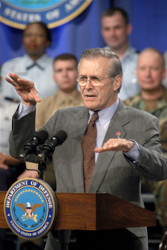Secretary of Defense Donald H. Rumsfeld responds to a question from the audience during a town hall meeting in the Pentagon on March 18, 2005. The Secretary and Vice Chairman of the Joint Chiefs of Staff Gen. Peter Pace, U.S. Marine Corps, took questions on a variety of topics from both military and civilian employees of the Department of Defense. 