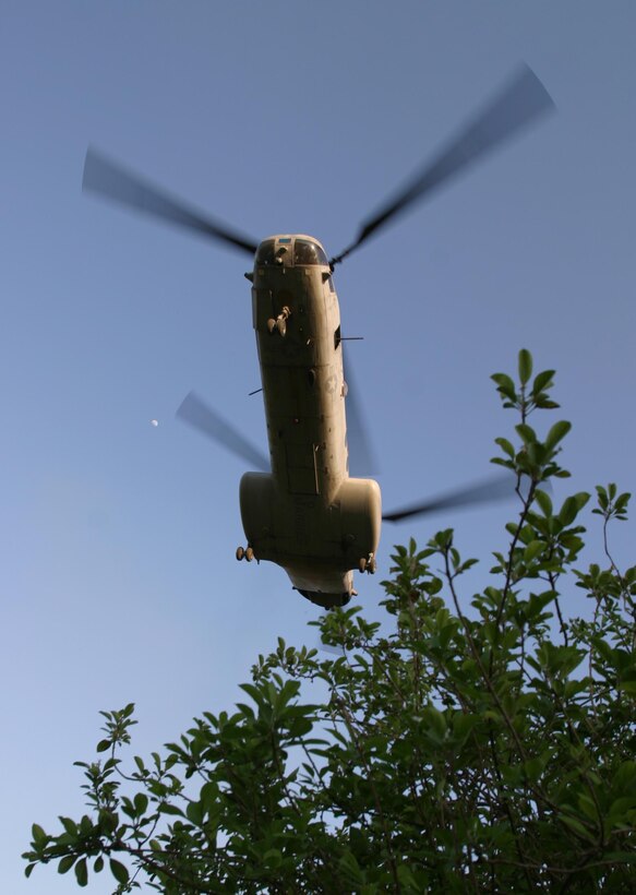 BAGHDAD, Iraq -- (Mar. 19, 2005) -  A CH-46E Sea Knight from Marine Medium Helicopter Squadron 165 (REIN) flies into Bravo Company's patrol base to pick up personnel. The 15th Marine Expeditionary Unit (Special Operations Capable) is conducting security and stabilization operations in the Greater Baghdad area.
