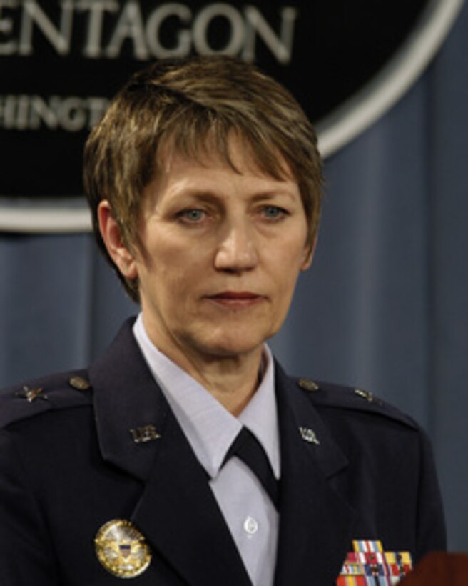 Commander of the Joint Task Force on Sexual Assault Prevention and Response Brig. Gen. K.C. McClain, U.S. Air Force, listens to a reporter's question during a Pentagon press briefing on the Confidentiality and Service Academy Sexual Assault and Leadership Survey on March 18, 2004. The survey is intended to assist senior Department and Academy leaders, and members of the Congress to identify changes or adjustments to improve future Academy operations, gender climates, and perceptions. 