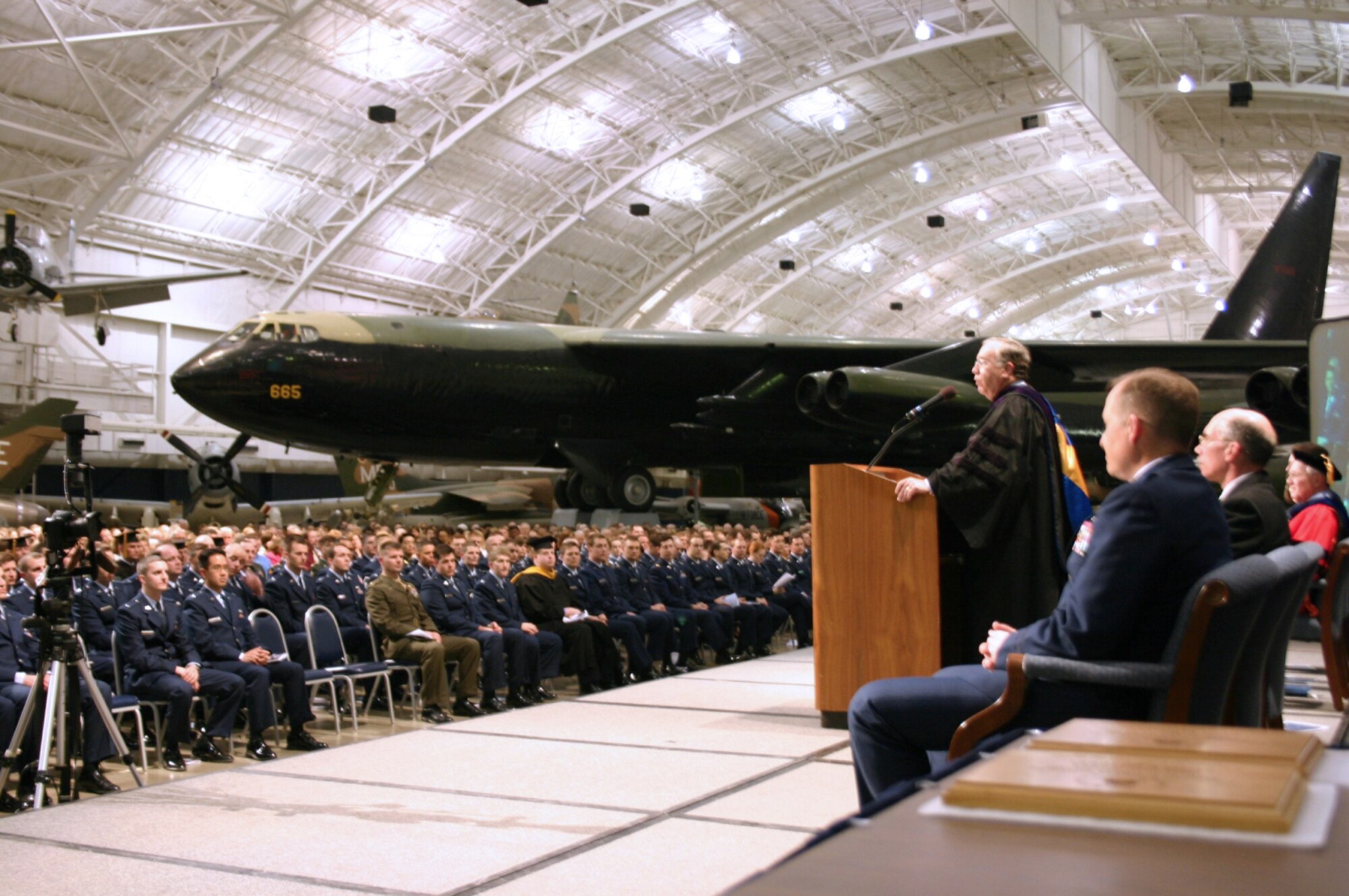 WRIGHT-PATTERSON AIR FORCE BASE, Ohio -- More than 230 scientists and engineers received graduate and doctorate degrees from the Air Force Institute of Technology during graduation ceremonies at the National Museum of the U.S. Air Force here March 21.  Ohio Congressman Dave Hobson presents the commencement address to the class.  (Courtesy photo)