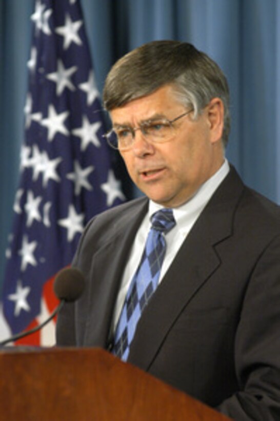 Deputy Under Secretary of Defense for Personnel and Readiness Charles Abell briefs reporters in the Pentagon on the new premium-based health care program being offered to qualified National Guard and Reserve component military personnel on March 24, 2005. The TRICARE Reserve Select program is designed to cover the individual service member as well as his or her dependents and will terminate at the end of the subscriber's service agreement. 