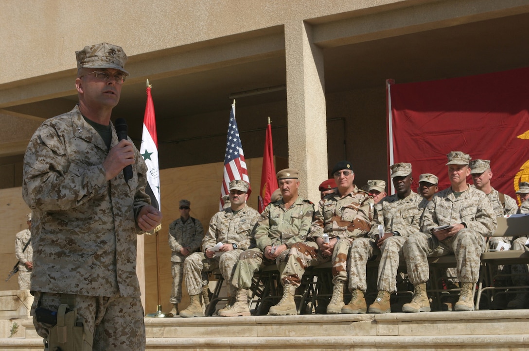 CAMP FALLUJAH, Iraq - The commanding general of II Marine Expeditionary Force (Forward), Maj. Gen. Stephen T. Johnson, addresses those present during a transfer of authority ceremony here March 27.
