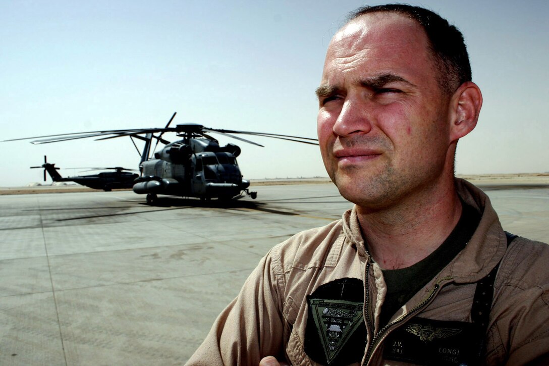 AL ASAD, Iraq -- Major Jim Longi, future operations planner for the 2d Marine Aircraft Wing and native of Poughkeepsie, N.Y., earned the Air Medal for flying more than 75 hours of combat missions over this desolate and dusty land.
