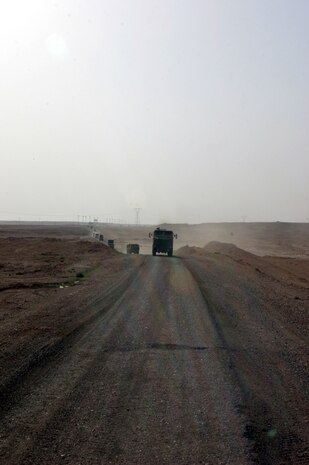 AL ASAD, Iraq - Marines of "Team Carnivore," or Transportation Company, Combat Logistics Battalion - 2, 2d Force Service Support Group (Forward), conduct a convoy from Al Asad to Haditha March 31. The company is comprised of more than 200 Marines from 14 different active-duty and reserve units from around the Marine Corps. They conduct convoy operations on a regular basis, transporting Marines, supplies and equipment throughout the CLB-2 area of operations. (Photo by Cpl. John E. Lawson Jr.)  -30-