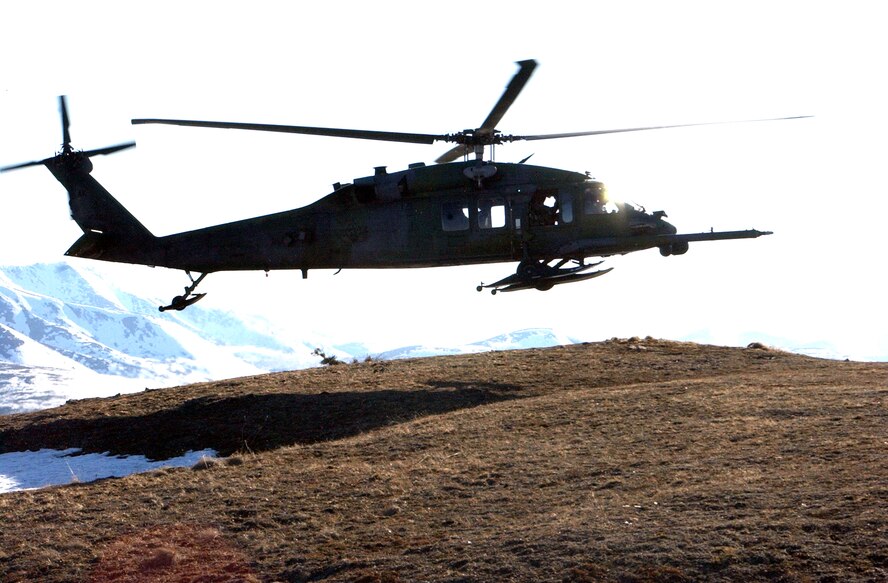 WHITE MOUNTAINS, Alaska -- An HH-60G Pave Hawk helicopter lands while on airborne alert during Exercise Cope Thunder here April 28.  The annual exercise involves nine units and about 600 Airmen and 50 aircraft from the Pacific Air Forces, Air Combat Command and the Alaska Air National Guard.  The helicopters are assigned to the 210th Rescue Squadron's Detachment 1 at nearby Eielson Air Force Base.  (U.S. Air Force photo by Airman Justin Weaver)