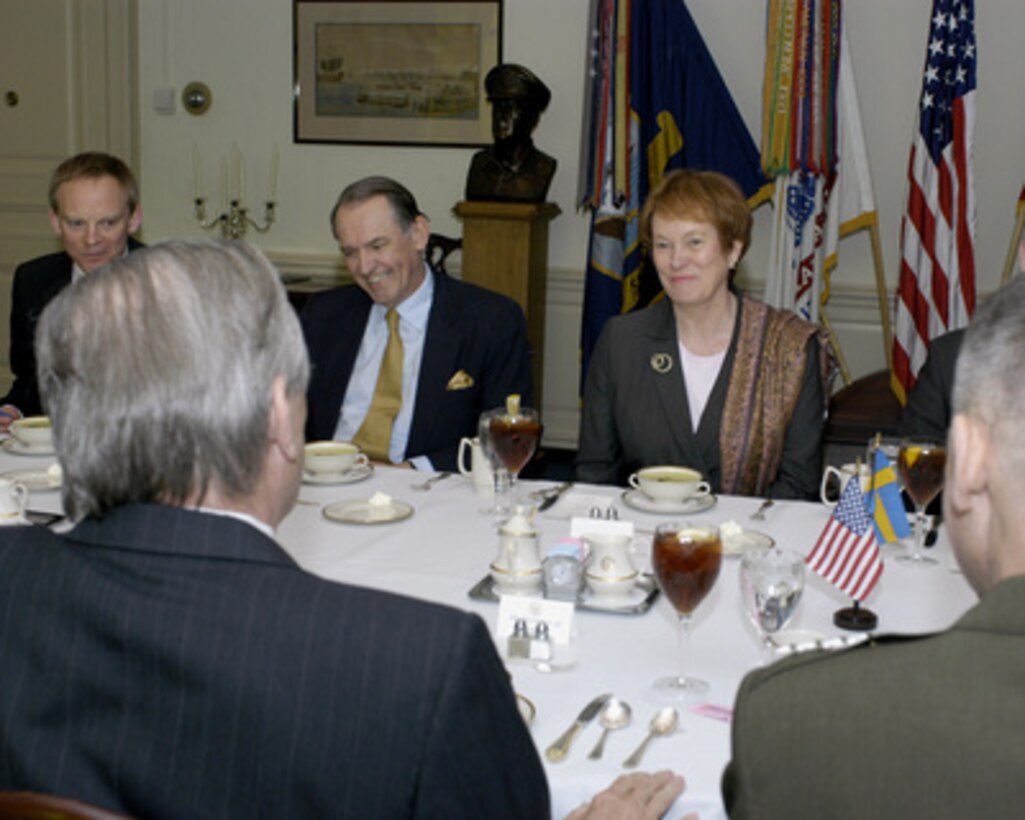 Secretary of Defense Donald H. Rumsfeld (left foreground) hosts a working luncheon for Swedish Minister of Defense Leni Bjorklund in the Pentagon on May 2, 2005. Rumsfeld and Bjorklund are meeting to discuss defense issues of mutual interest. From left to right, Military Advisor Rear Adm. Stefan Engdahl, Swedish Ambassador to the U.S. Jan Eliasson, and Vice Chairman of the Joint Chiefs of Staff Gen. Peter Pace, U.S. Marine Corps (foreground right). 