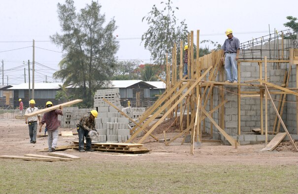 SOTO CANO AIR BASE, Honduras -- New buildings going up here will replace the more than 270 wooden structures called "hooches" where Joint Task Force-Bravo troops presently live.  Construction is ongoing for 44 four-unit apartments.  Officials said they also plan to build seven dormitories.  (U.S. Air Force photo by Master Sgt. Lono Kollars)