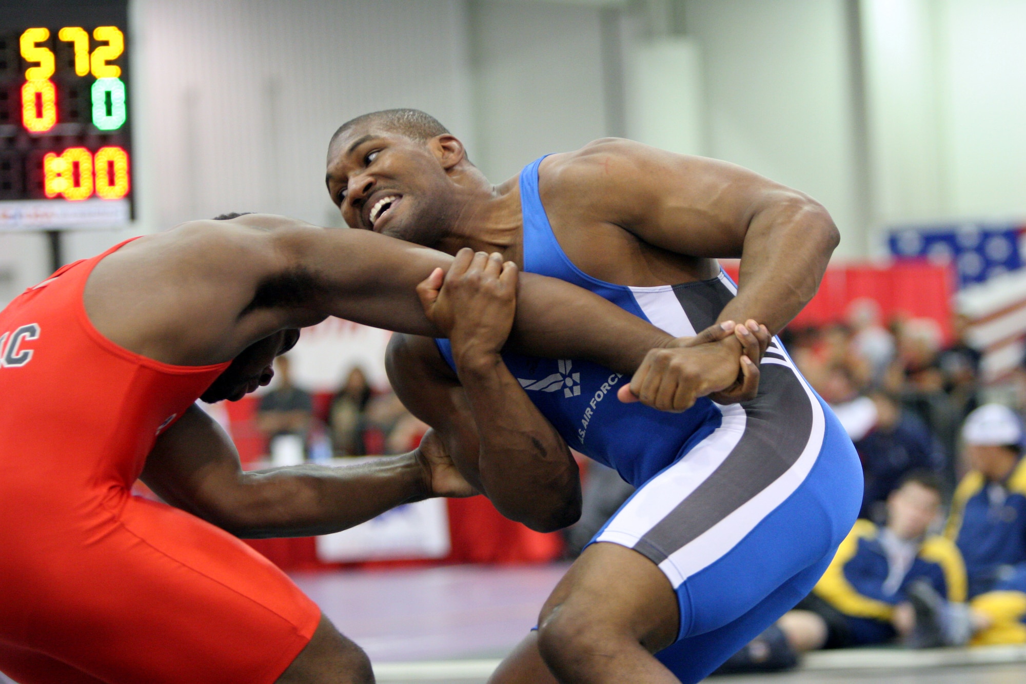 LAS VEGAS -- Lorenzo Peterson (right), a 211.2-pound division Greco-Roman wrestler, grapples with his opponent, R.C. Johnson of the New York Athletic Club, during a match at the 2005 U.S. Nationals Wrestling tournament held here April 29.  The Air Force team won first runner-up in the team standings for the tournament.  (U.S. Air Force photo by Master Sgt. Robert W. Valenca)