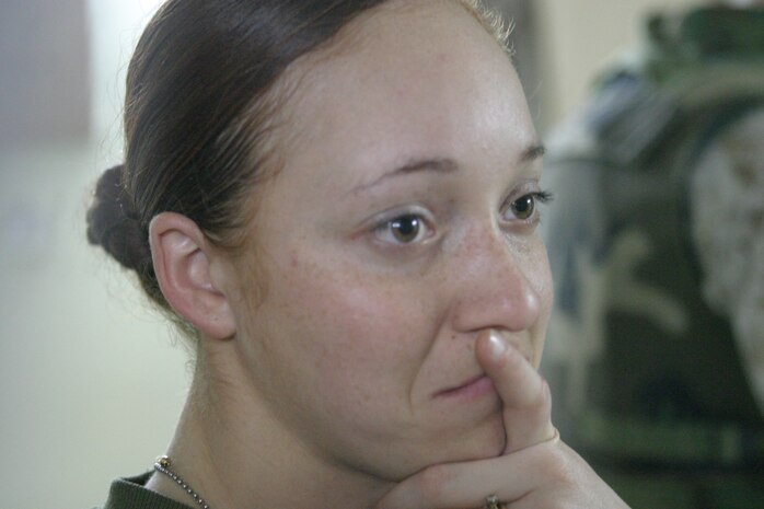CAMP TAQADDUM, Iraq - Petty Officer 2nd Class Iris Manso, a dental technician with 2d Dental Battalion, 2d Force Service Support Group (Forward), waits patiently in line to donate blood at the Surgical Shock Trauma Platoon March 3 here. The walking blood bank was called to action for a Soldier who was seriously injured by an improvised explosive device that night.