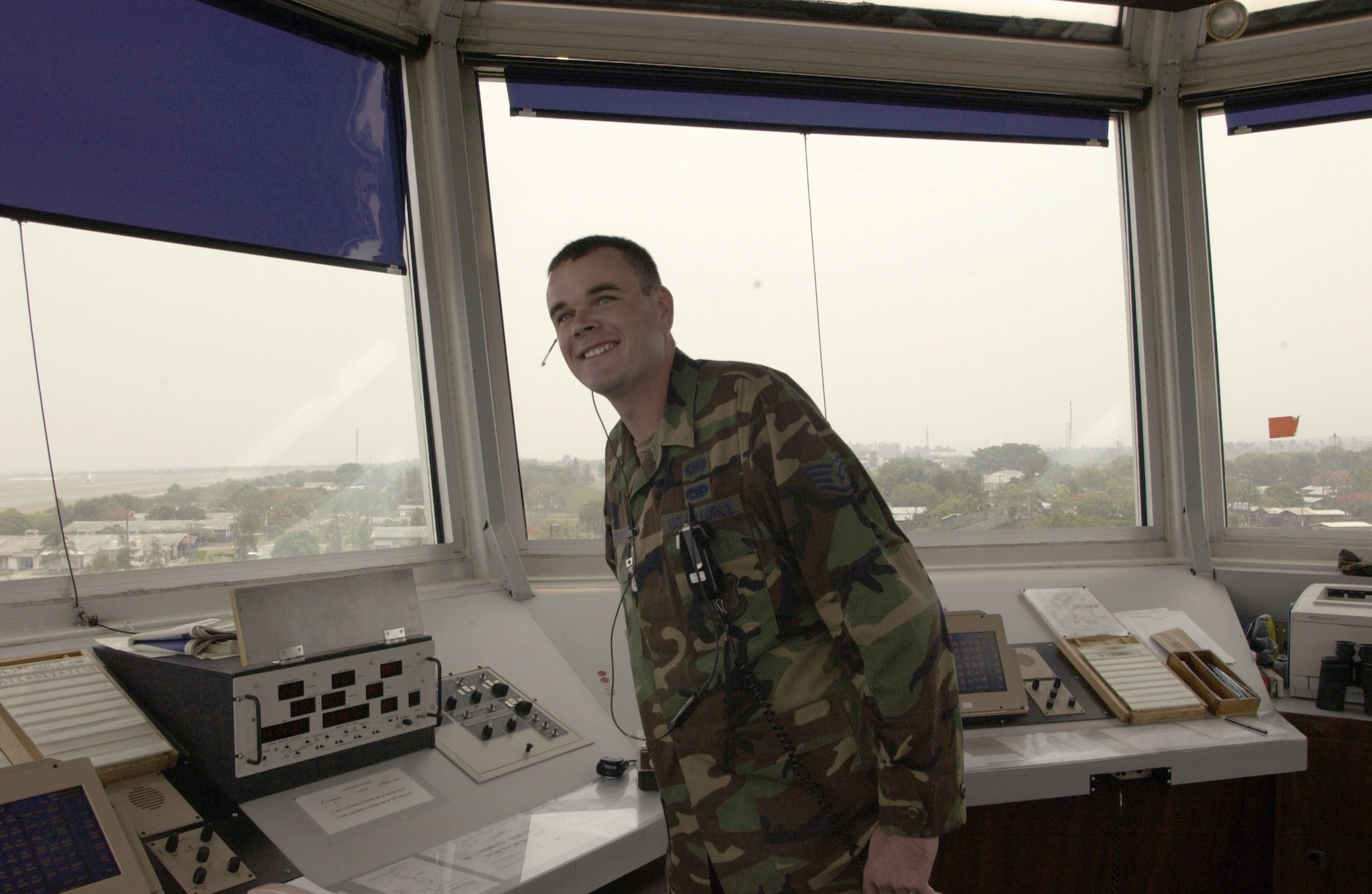 SOTO CANO AIR BASE, Honduras -- Staff Sgt. Dennis Kraffert gives an aircraft landing instructions.  All air traffic controllers at the base must be bilingual since the task force shares the base with the Honduran air force.  Sergeant Kraffert is an air traffic controller with Joint Task Force-Bravo.  (U.S. Air Force photo by Master Sgt. Lono Kollars)