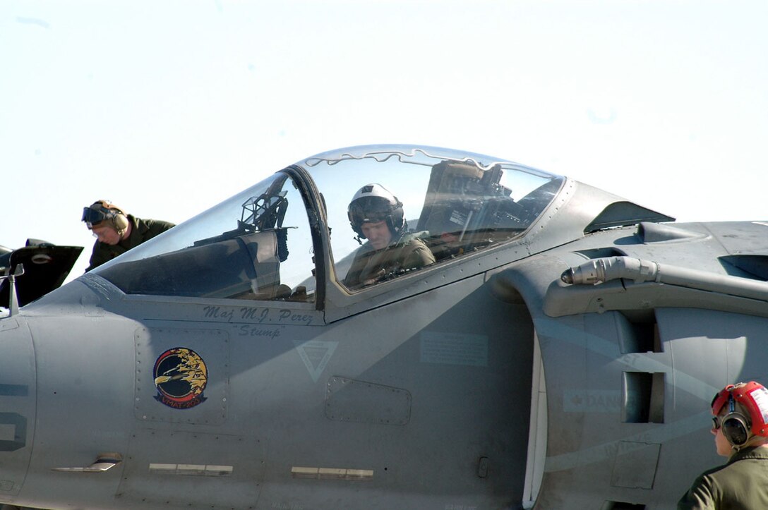1st Lt. Eric Grunke, native of Boise, Idaho, a replacement pilot with Marine Attack Training Squadron-203 who is training for his certification on the AV-8B Harrier, goes through a pre-flight checklist prior to flying a training mission. VMAT-203 visits Yuma four times a year to take advantage of Yuma's ranges and perfect flying weather.