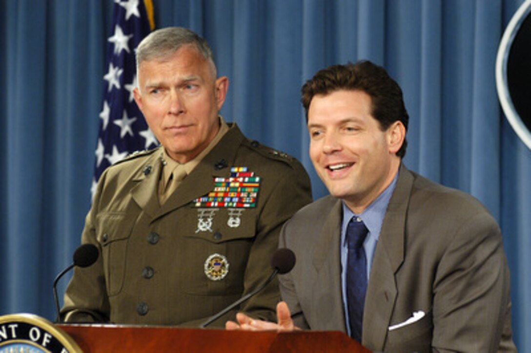 Principal Deputy Assistant Secretary of Defense for Public Affairs Lawrence Di Rita (right) politely refuses to comment further on any issues relating to the Base Realignment and Closure decisions during a Pentagon press briefing on May 10, 2005. Di Rita said Secretary of Defense Donald H. Rumsfeld would be making statements on that subject within the next six days. Di Rita and Joint Staff Director for Operations Lt. Gen. James T. Conway, U.S. Marine Corps, briefed the press on a variety of defense issues. 