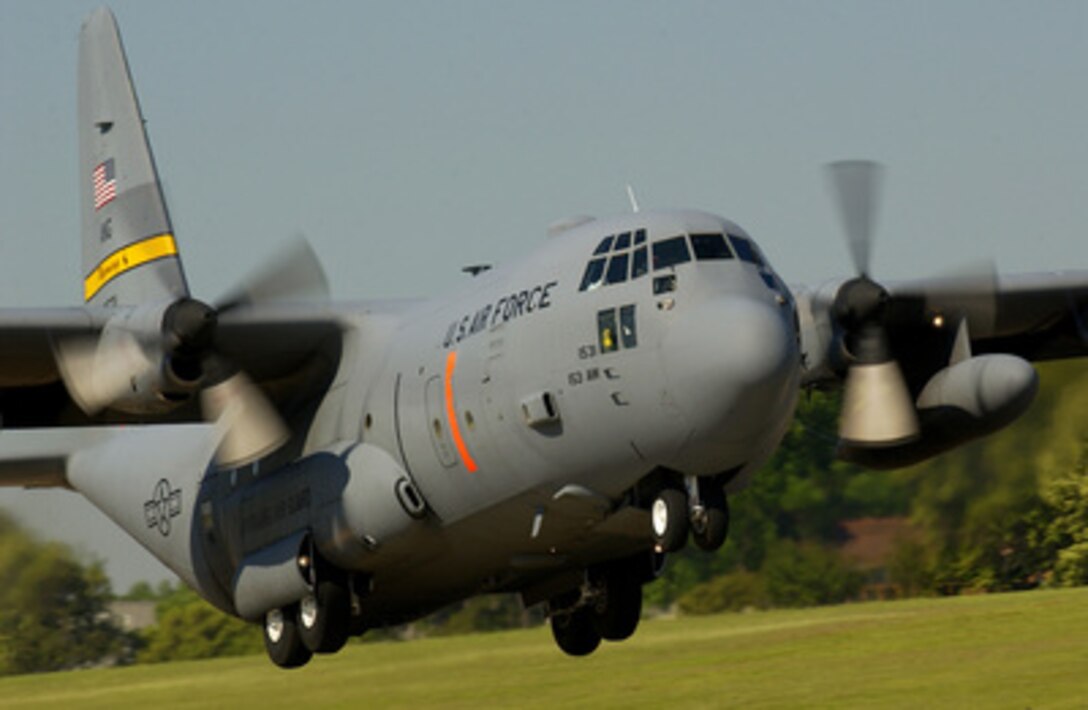 A C-130 Hercules Modular Airborne Firefighting System aircraft takes off for a mission during an annual MAFFS exercise at Donaldson Center Industrial Air Park in Greenville, S.C., on May 4, 2005. The exercise is a one-week annual training and re- certification exercise joining air and ground personnel from the Federal Department of Agriculture's Forest Service, U.S. Air National Guard and U.S. Air Force Reserve units. The exercise involves eight C-130 Hercules aircraft that fly continuous missions dropping water on South Carolina's Sumter National Forest to prepare crews for wild land firefighting missions. The C-130 is assigned to the 153rd Air Lift Squadron, Wyoming Air National Guard in Cheyenne, Wyo. 