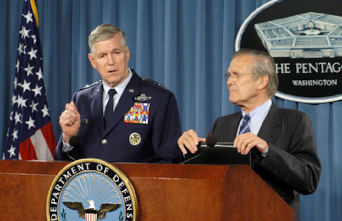 Chairman of the Joint Chiefs of Staff Gen. Richard B. Myers (left), U.S. Air Force, and Secretary of Defense Donald H. Rumsfeld (right) talk with reporters in the Pentagon about the process used by which the Base Realignment and Closure Commission on May 12, 2005. The commission has the mandate to reduce excess capacity in owned or leased properties in order to save money. Rumsfeld acknowledged it was a contentious undertaking with feelings running high in many communities and said the decisions were well thought out and necessary for the future well being of the U.S. military. 