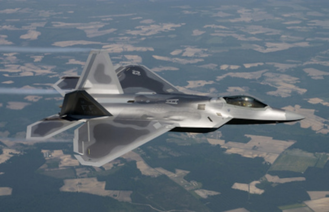 The first operational F/A-22 Raptor flies to its permanent home at Langley Air Force Base, Va., on May 12, 2005. The Raptor is the first stealth supersonic fighter in the world. This aircraft is the first of 26 Raptors to be delivered to the Air Force's 27th Fighter Squadron. 