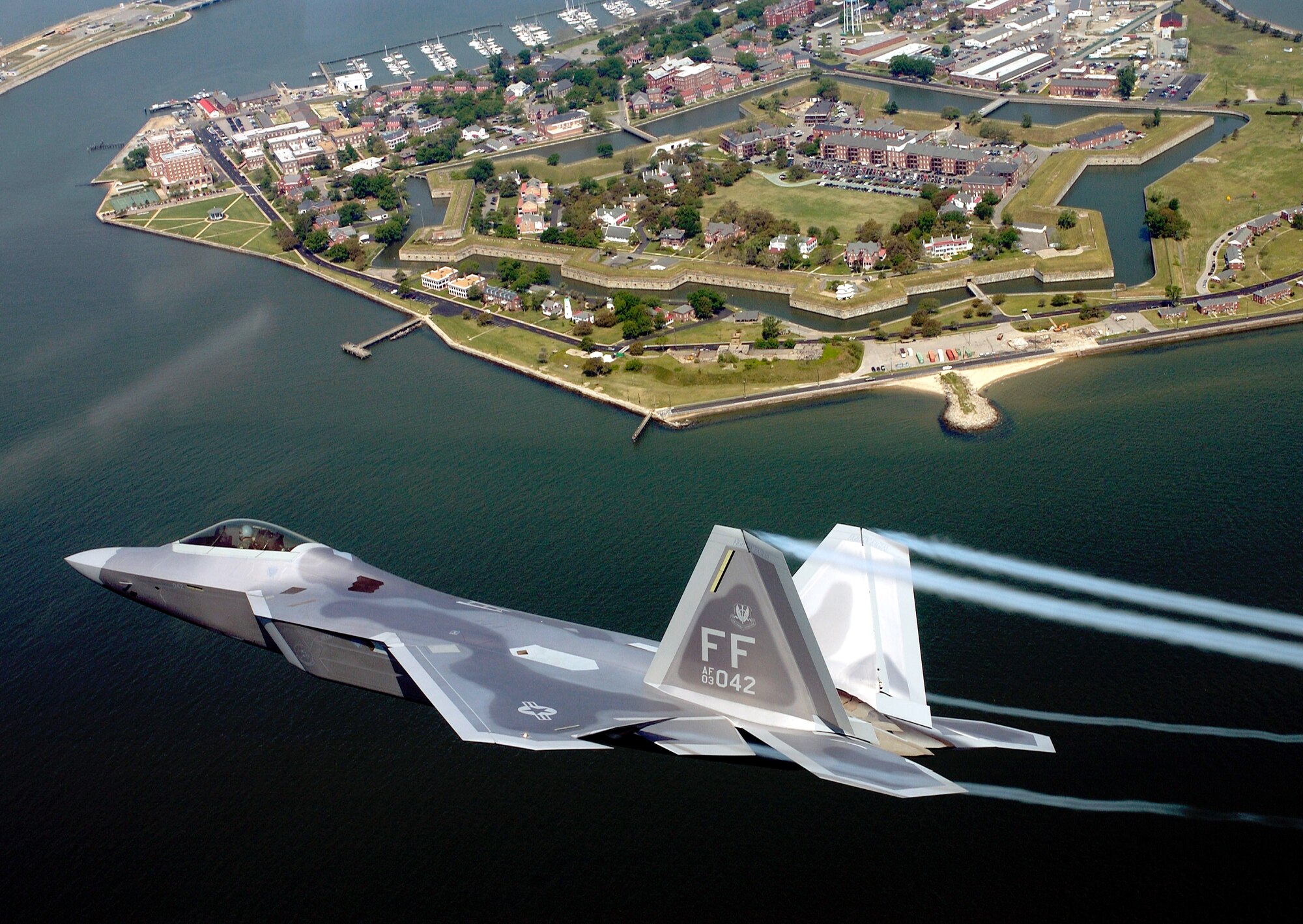 OVER VIRGINIA -- Lt. Col. James Hecker flies over Fort Monroe before delivering the first operational F-22A Raptor to its permanent home at Langley Air Force Base, Va., on May 12.  This is the first of 26 Raptors to be delivered to the 27th Fighter Squadron.  The Raptor program is managed by the F-22A System Program Office at Wright-Patterson AFB, Ohio.  Colonel Hecker is the squadron's commander.  (U.S. Air Force photo by Tech. Sgt. Ben Bloker)

