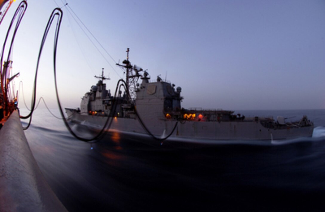 The USNS Walter S. Diehl (T-AO 193) conducts a replenishment at sea operation with the USS Antietam (CG 54) on May 6, 2005. The Antietam is conducting maritime security operations in the North Arabian Gulf. Maritime security operations set the conditions for security and stability in the maritime environment. 