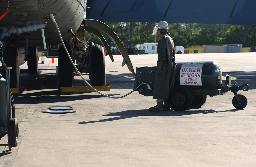 OPERATION ENDURING FREEDOM -- Airman 1st Class Nathan Jacobson performs liquid oxygen service to a B-52 Stratofortress at a forward-deployed location May 16 in preparation for a sortie supporting operations Iraqi Freedom and Enduring Freedom.  He is a crew chief assigned to the 40th Expeditionary Maintenance Squadron.  (U.S. Air Force photo by Staff Sgt. Jocelyn Rich)                             