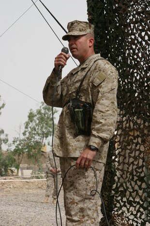 CAMP TAQADDUM, Iraq (May 18, 2005) - Brigadier Gen. John E. Wissler, commander of 2d Force Service Support Group (Forward) and Brooklyn Park, Minn., native, speaks with the Marines, Sailors and Soldiers who attended his frocking ceremony here May 18. “I get to serve with the best that America has to offer, and they are represented by Pfc. Roberts,” said Wissler. “The youth of America committed to our nation in a time of war as United States Marines. I would like to say thank you to every Marine I’ve ever served with.  Every one of them has a little piece of this promotion today.” (Photo by Sgt. Kristin S. Jochums)