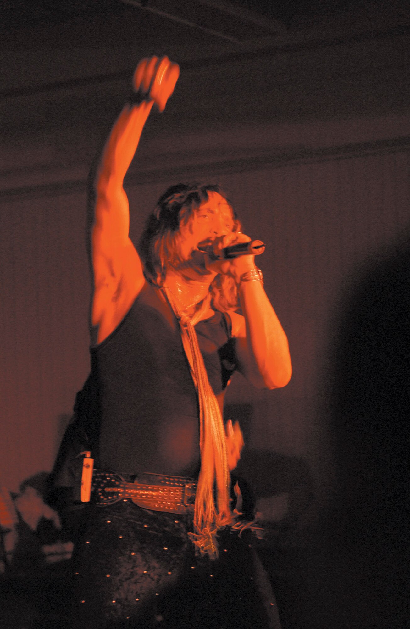 KUNSAN AIR BASE, South Korea -- Kevin DuBrow, frontman for heavy metal band Quiet Riot, energizes the crowd here May 17 during the evening's show.  Quiet Riot returned for the first time since 2002 along with other 1980s metal giant Skid Row.  (U.S. Air Force photo by Staff Sgt. Alan Port)