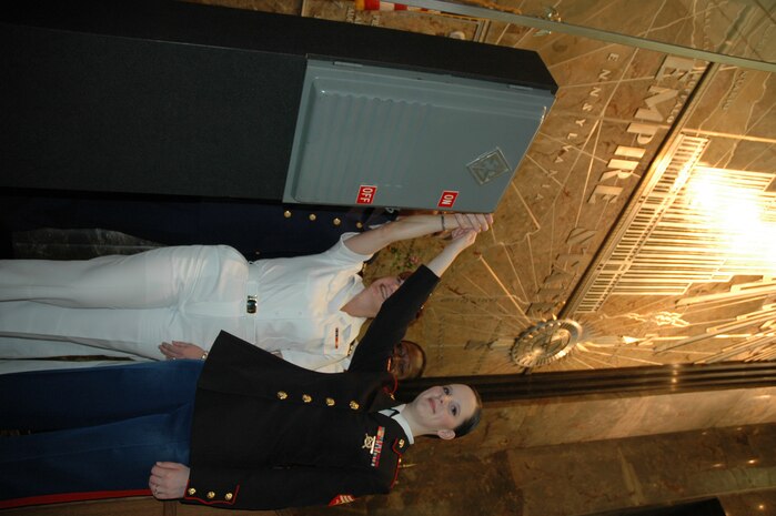 AL ASAD, Iraq - Pictured here are the Marines of Mortuary Affairs, Detachment Al Asad, Service Company, Headquarters and Service Battalion, 2nd Force Service Support Group.  They have one of the most difficult jobs in Corps.  Tasked with recovering, processing and evacuating deceased personnel to their families as expeditiously as possible, the detachment takes care of deceased coalition forces personnel and contractors in the Al Anbar province.  The detachment receives deceased personnel, whom they refer to as ?angels,? from the hospital here after medical personnel have exhausted all means to try to keep them alive or after conducting search and recovery operations in the battlefield.