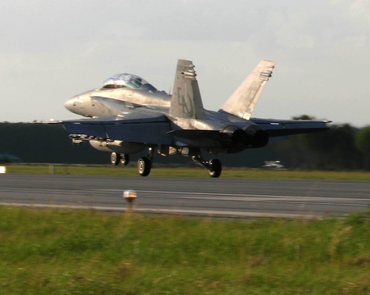 United States Marine Corps Pilots Captain Mark Bortmen and Captain Greg Summa complete a Marine Corps wide record while landing.  Marine All Weather Fighter Attack Squadron 332 (VMFA(AW)-332) completed its 100,000th hour of mishap-free flight time that started back in 1978.  Capt. Bortmen and Capt. Summa piloted the 100,000th hour from Marine Corps Air Station Cherry Point, NC, to VMFA(AW)-332's home station, Marine Corps Air Station Beaufort, SC on May 24, 2005. (Official USMC photo by LCpl Brown)(RELEASED)