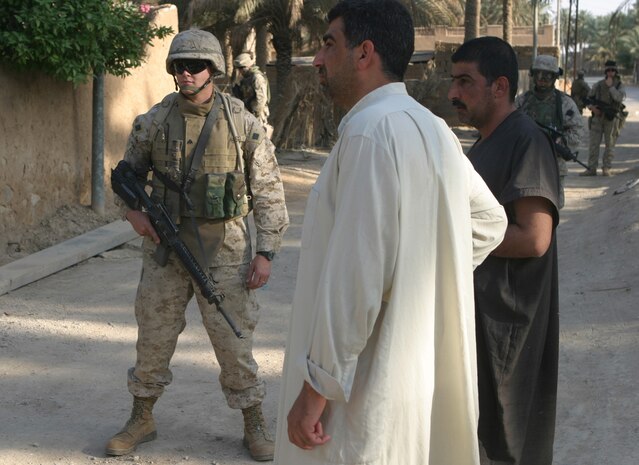 As a disburser with Service Company, Headquarters and Support Battalion, 2nd Force Service Support Group (FWD), Cpl. Justin R. Molgaard, a Carlsbad, N.M. native, gets to experience a variety of things in Iraq.  He recently was involved in Operation New Market and made payments to locals in Haditha that had damaged property.  Molgaard says insurgency is thick and it is important for Americans to make a good impression.