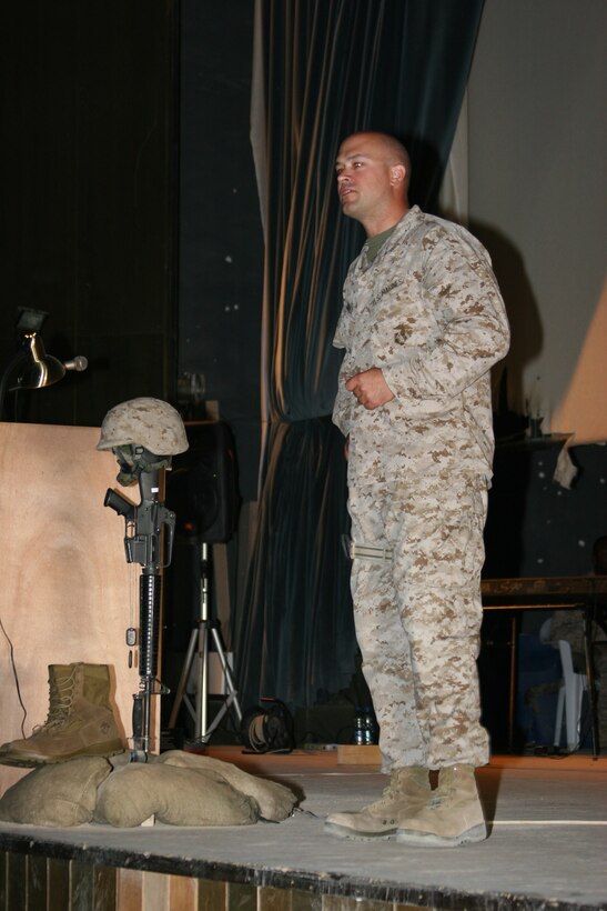 AL ASAD, Iraq ? Major Sean Riddell, the Alpha Company commander with 6th Engineer Support Battalion speaks to his Marines about his memories of the fallen first sergeant, First Sgt. Michael S. Barnhill. Barnhill was killed when his humvee was struck by an improvised explosive device.