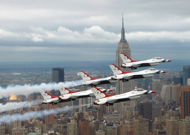 NEW YORK -- Six F-16 Fighting Falcons with the U.S. Air Force Thunderbirds aerial demonstration team fly in delta formation in front of the Empire State Building during an air show May 26.  (U.S. Air Force photo by Tech. Sgt. Sean Mateo White)                      