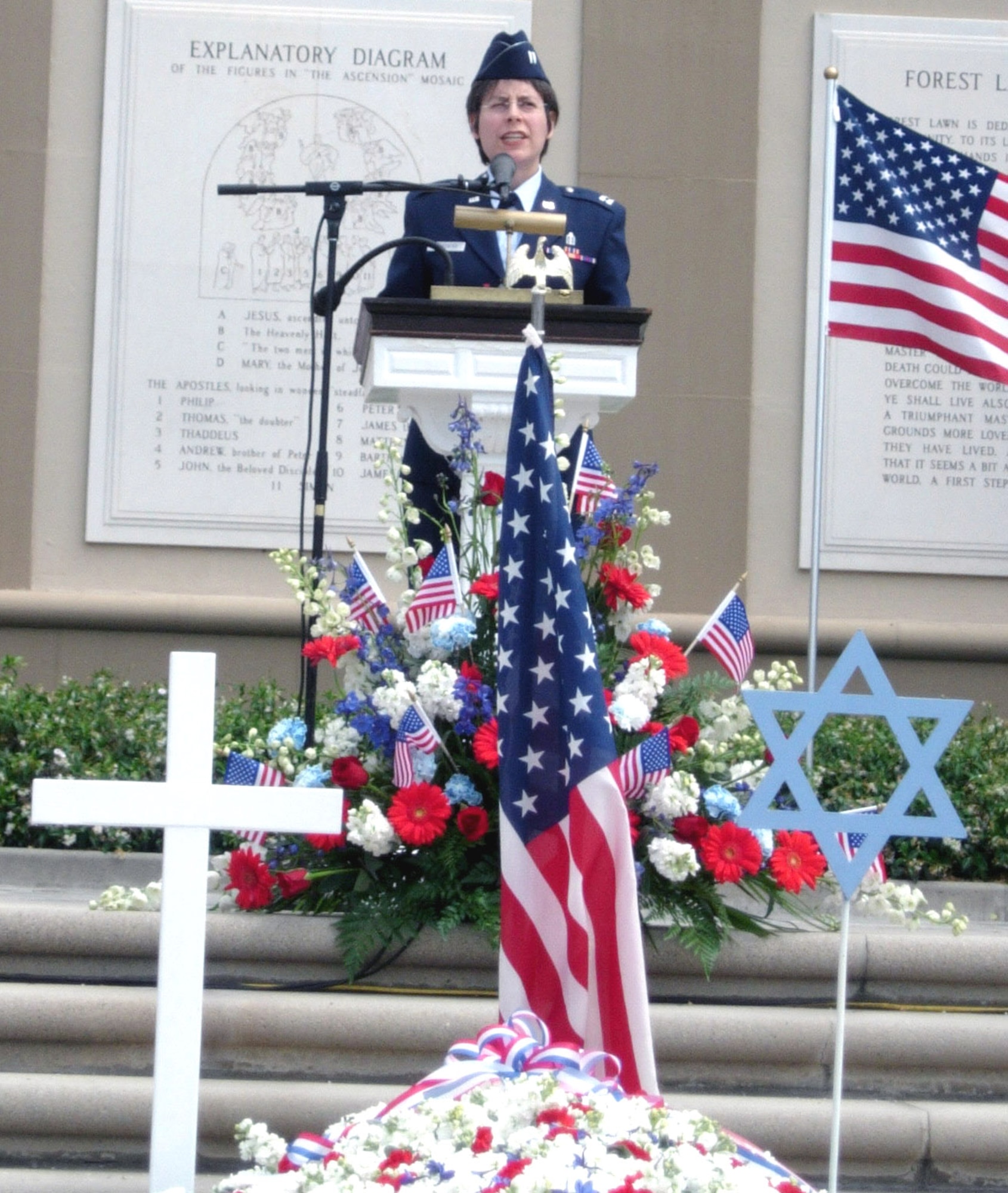 CYPRUS, Calif. -- Chaplain (Capt.) Sarah Schechter speaks to a crowd of more than 1,000 people at a Memorial Day ceremony here May 30.  Chaplain Schecter, who became the Air Force's first female rabbi in 2003, spoke about honor, sacrifice and freedom of religion.  She is stationed at nearby Los Angeles Air Force Base.  (U.S. Air Force photo by 1st Lt. Mike Hyland)