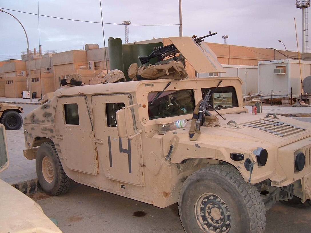 Before: An up armored humvee is shown just days before it was attacked May 10, 2005. The vehicle was later struck on the right side by a single man driven, foward loaded suicide vehicle born improvised explosive device during combat operations in the streets of Karabilah, Iraq during Operation Matador. Photo Courtesy of Staff Sgt. John B. Francis.