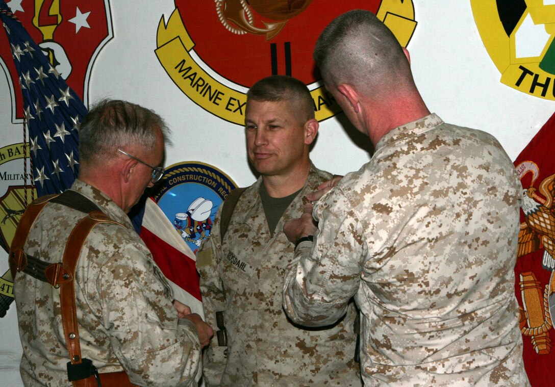 CAMP TAQADDUM, Iraq (Nov. 2, 2005) ? Married couple Cpl. Abigail E. Grant and Sgt. Shaun L. Grant enjoy their time together after having the chance to see each other here Nov. 2. Abigail E. Grant is a the operations watch noncommissioned officer for Combat Logistics Regiment-25, 2nd Force Service Support Group (Forward), and Shaun L. Grant is a platoon sergeant for Motor Transportation, II Marine Headquarters Group, II Marine Expeditionary Force.