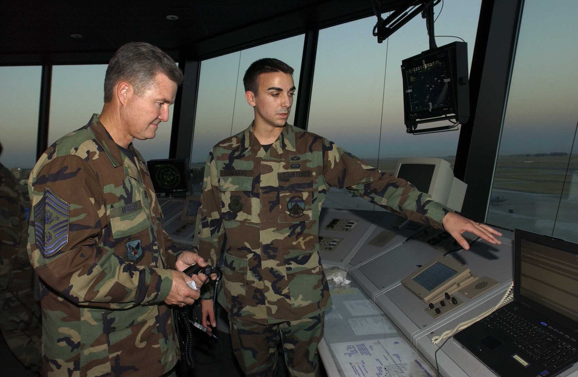 TRAVIS AIR FORCE BASE, Calif. (AMCNS) - Senior Airman Charles Edwards, 60th Operations Support Squadron, gives Chief Master Sgt. of the Air Force Gerald Murray a tour of the control tower. Chief Murray visited Travis Oct. 13 and 14 to meet and discuss issues with Airmen here.