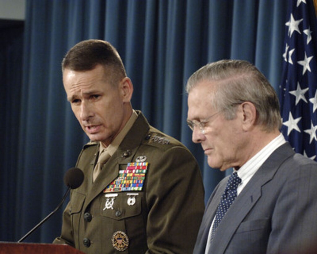 Chairman of the Joint Chiefs of Staff Gen. Peter Pace, U.S. Marine Corps, responds to a reporter's question during a press briefing with Secretary of Defense Donald H. Rumsfeld in the Pentagon on Nov. 1, 2005. Pace and Rumsfeld updated reporters on current operations. The press conference was the first for Pace since being sworn in as the 16th Chairman of the Joint Chiefs of Staff in September. 