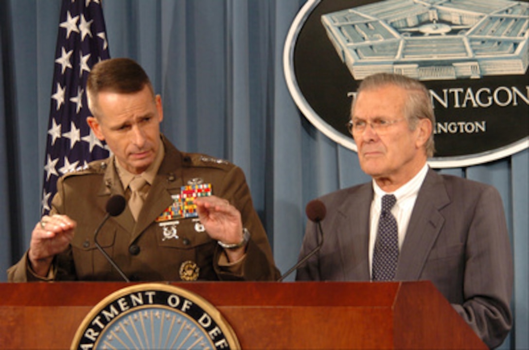 Chairman of the Joint Chiefs of Staff Gen. Peter Pace, U.S. Marine Corps, responds to a reporter's question during a press briefing with Secretary of Defense Donald H. Rumsfeld in the Pentagon on Nov. 1, 2005. Pace and Rumsfeld updated reporters on current operations. The press conference was the first for Pace since being sworn in as the 16th Chairman of the Joint Chiefs of Staff in September. 