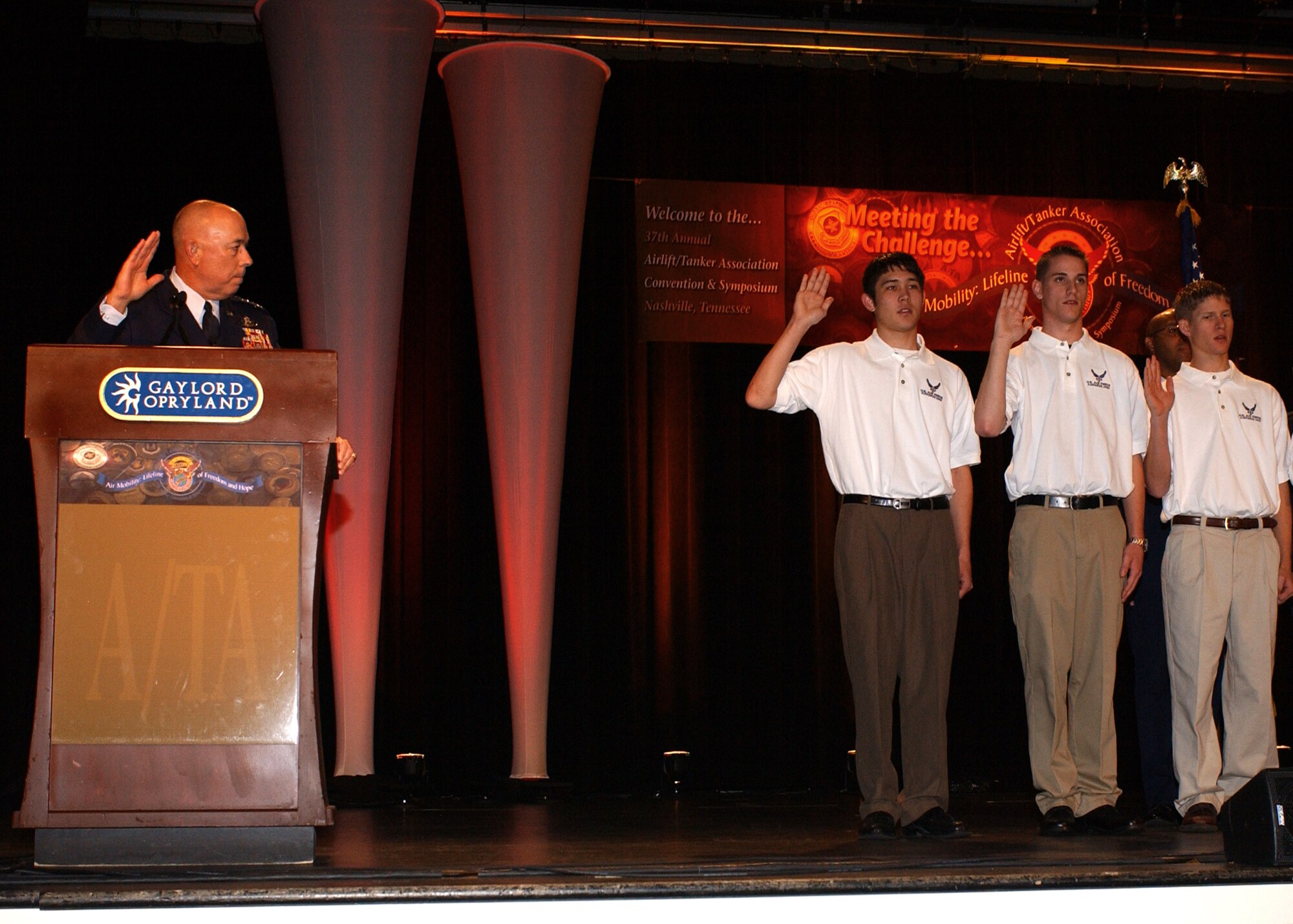 NASHVILLE, Tenn. (AMCNS) -- During the 37th Annual Airlift/Tanker Association Conference here Oct. 28-29, Air Force Chief of Staff Gen. T. Michael Moseley administers the Oath of Enlistment to some of the Air Force's newest recruits.