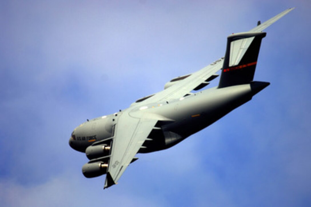 A C-17A Globemaster III aircraft turns on its final approach to March Air Reserve Base, Calif., on Oct. 18, 2005. The Globemaster is replacing the C-141 Starlifter aircraft. 