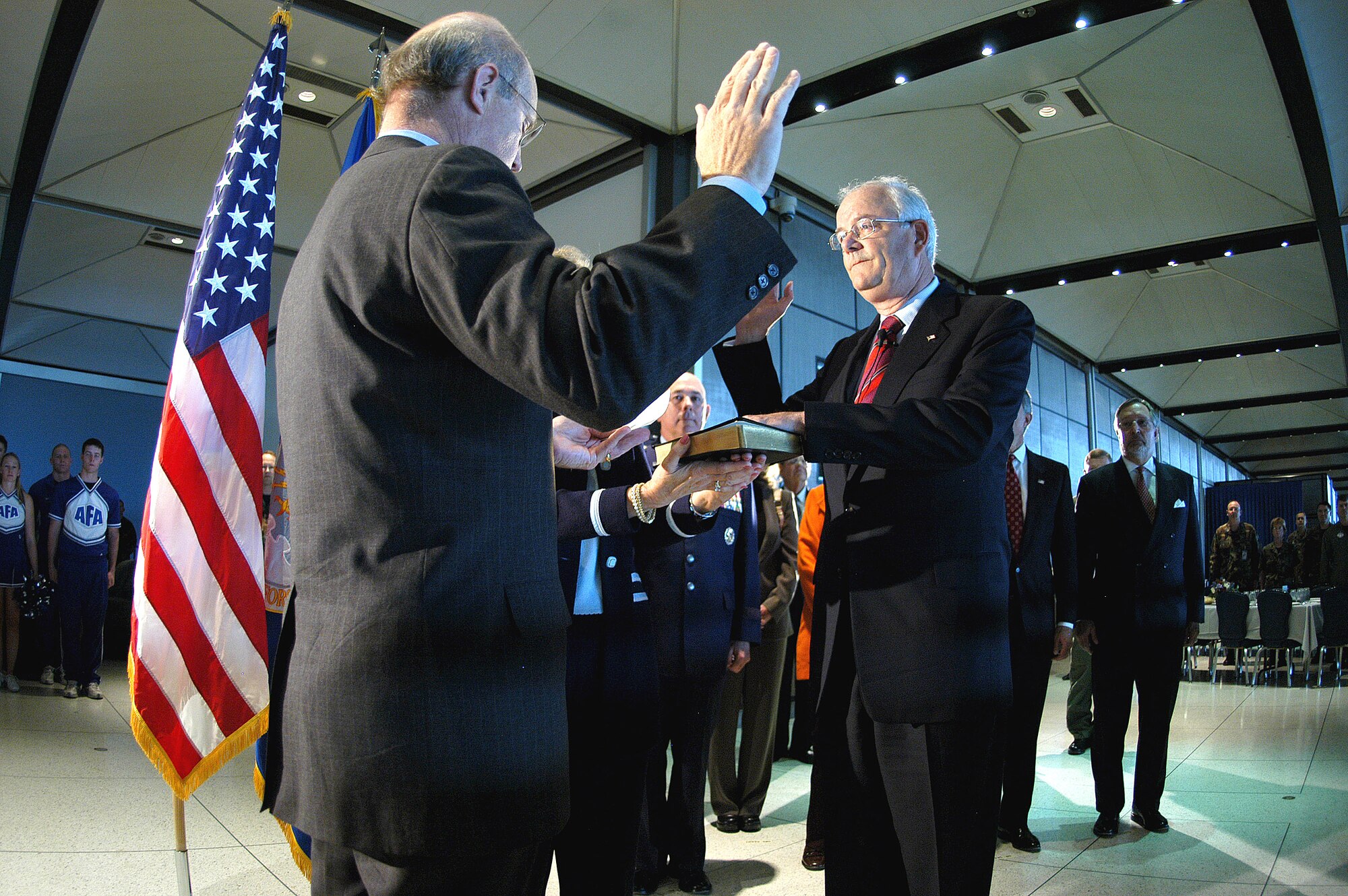 U.S. AIR FORCE ACADEMY, Colo. (AFPN) -- Secretary of the Air Force, Michael W. Wynne, takes the oath of office from Pete Geren during his swearing-in ceremony today at Mitchell Hall here. Mr. Geren has been the acting SECAF since July 29. (U.S. Air Force photo by Charley Starr)                  