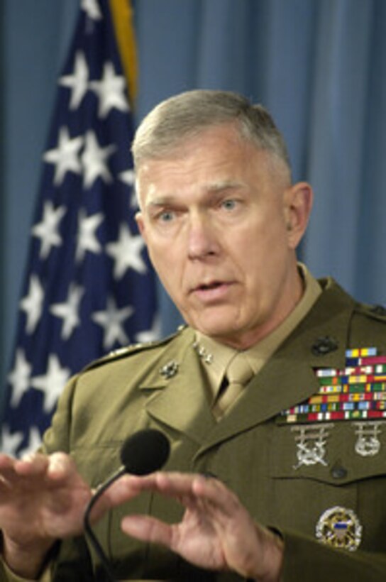 Joint Staff Director of Operations Lt. Gen. James Conway, U.S. Marine Corps, responds to a reporter's question during a press briefing with Principal Deputy Assistant Secretary of Defense for Public Affairs Lawrence Di Rita on Nov. 3, 2005. 