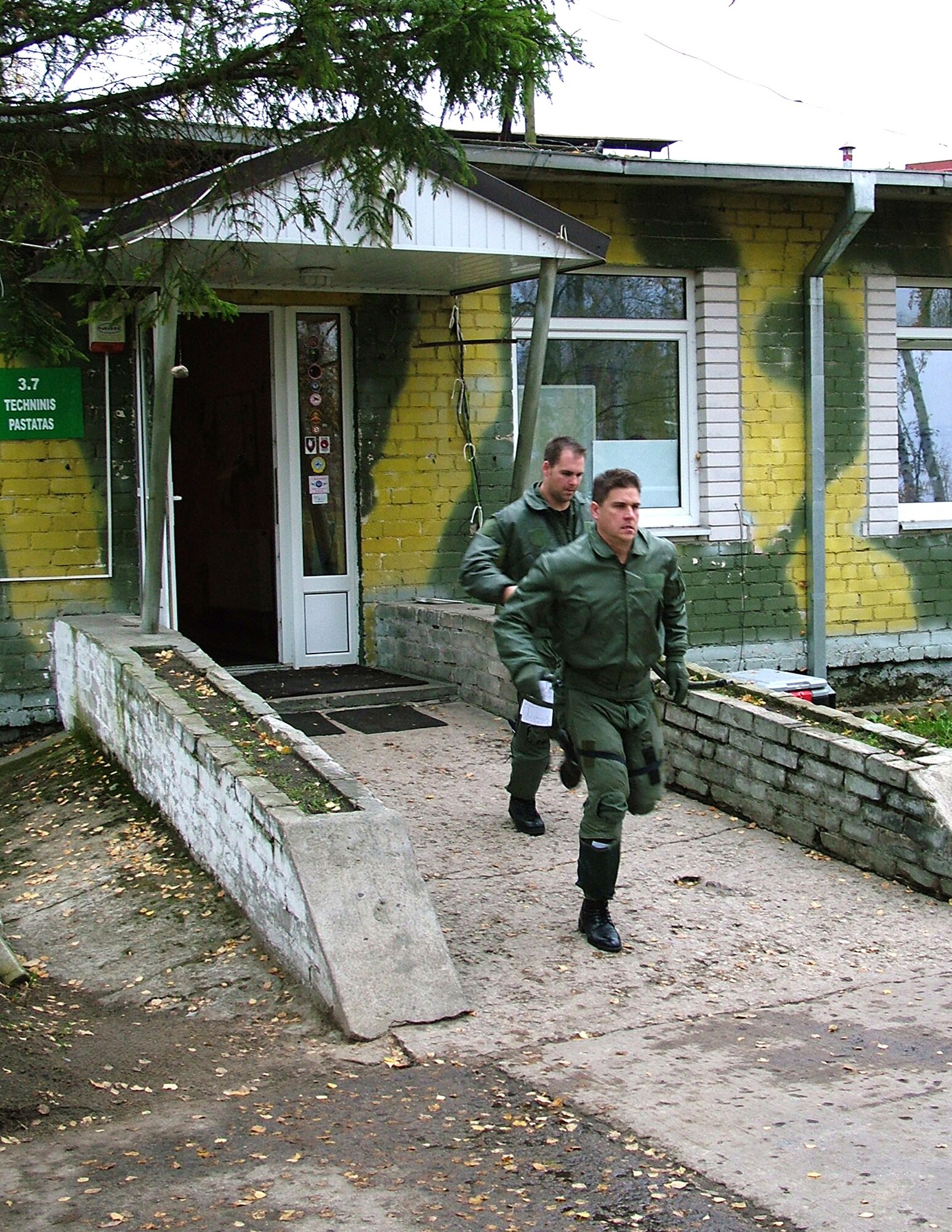 SIALULIAI, Lithuania (AFPN) -- Capt. Matthew Reynolds (back), and Lt Col. David Youtsey (front), run to their alert fighters during a scramble exercise here. The 23rd EFS is participating in NATO's Baltic Air Policing mission, providing security over the skies of Lithuania, Latvia and Estonia. Captain Reynolds  is a 23rd EFS alert pilot and Colonel Youtsey is the 23rd EFS detachment commander. (U.S. Air Force photo by Capt. Thomas Crosson)