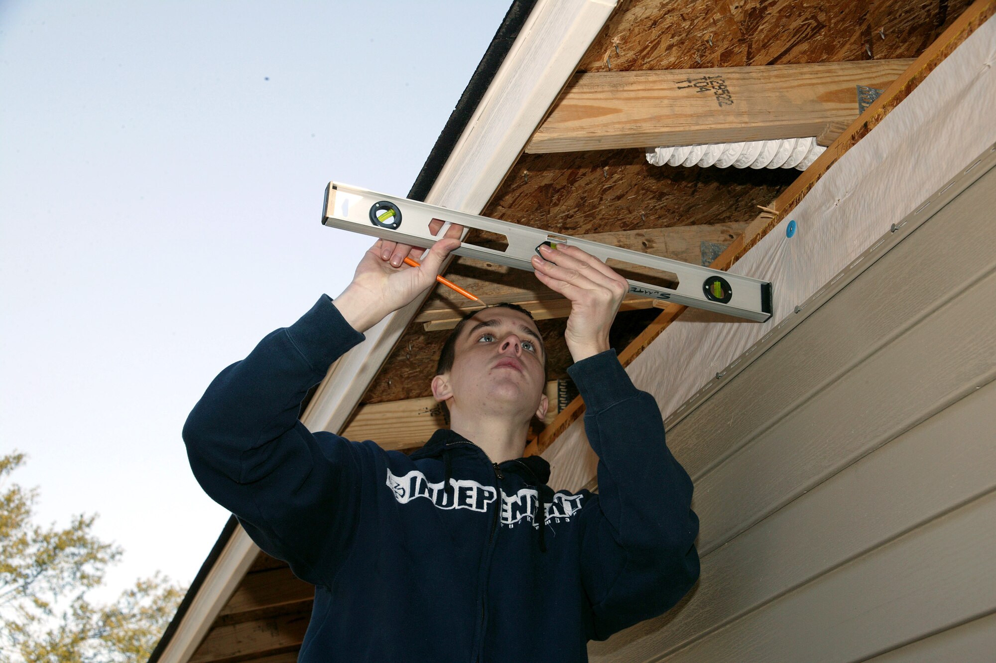 SUMTER, S.C. (AFPN) -- Airman 1st Class Carl Disher works on one of three homes being constructed Oct. 29 by the Habitat for Humanity. Airman Disher is a volunteer from the 20th Component Maintenance Squadron at Shaw Air Force Base, S.C. (U.S. Air Force photo by Senior Airman Joel Mease)